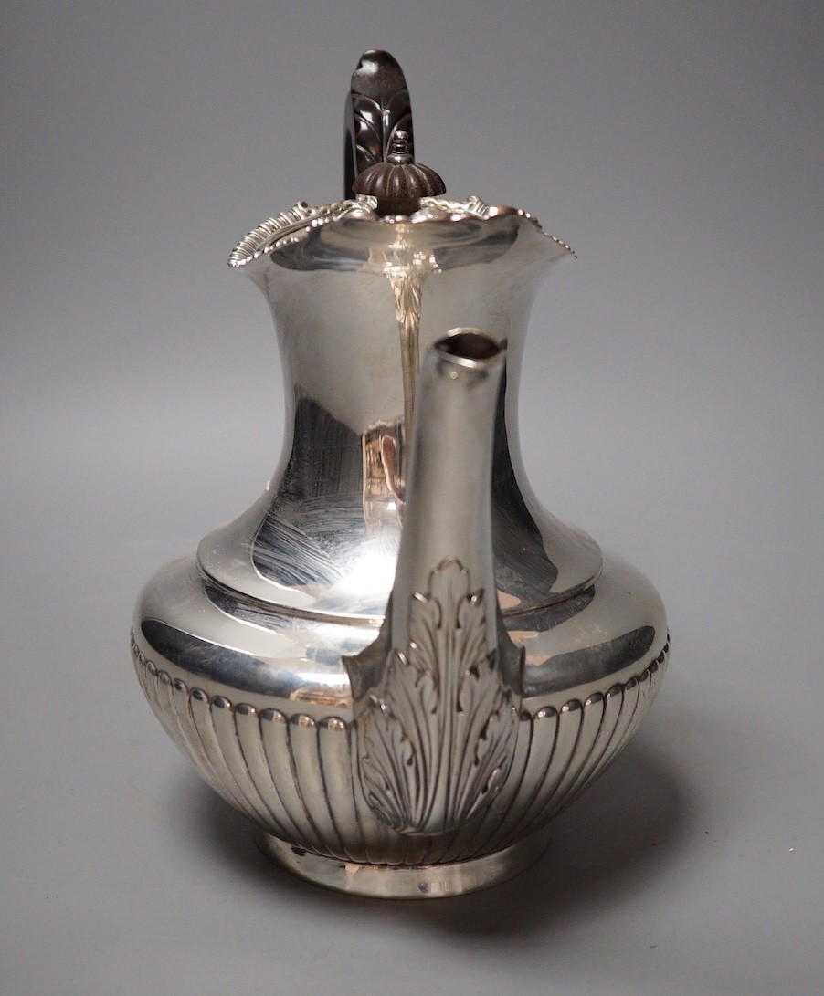 A late Victorian demi-fluted silver coffee pot, Gibson & Langman (Goldsmiths & Silversmiths Co Ltd), London, 1898, height 22.8cm